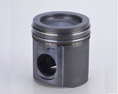 Ring carrier piston with cooling channel